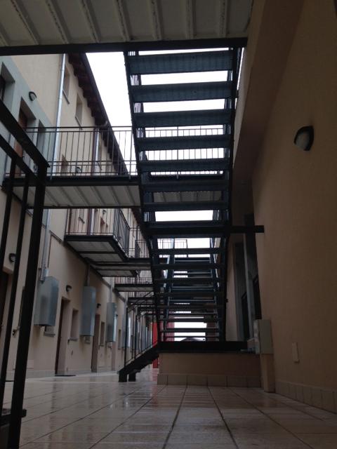 Top of stairs leading to apartment